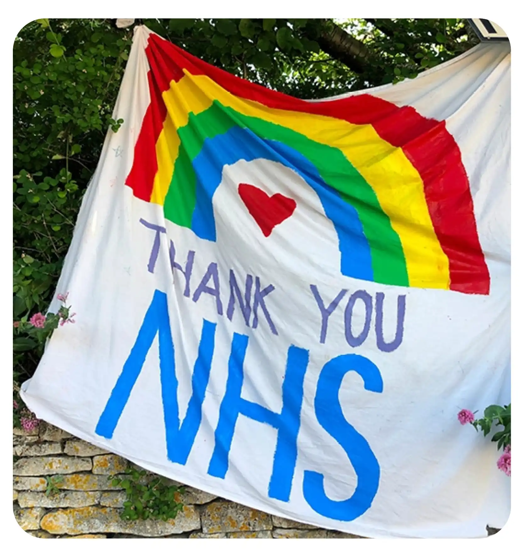 woman on a horse doing the heart sign