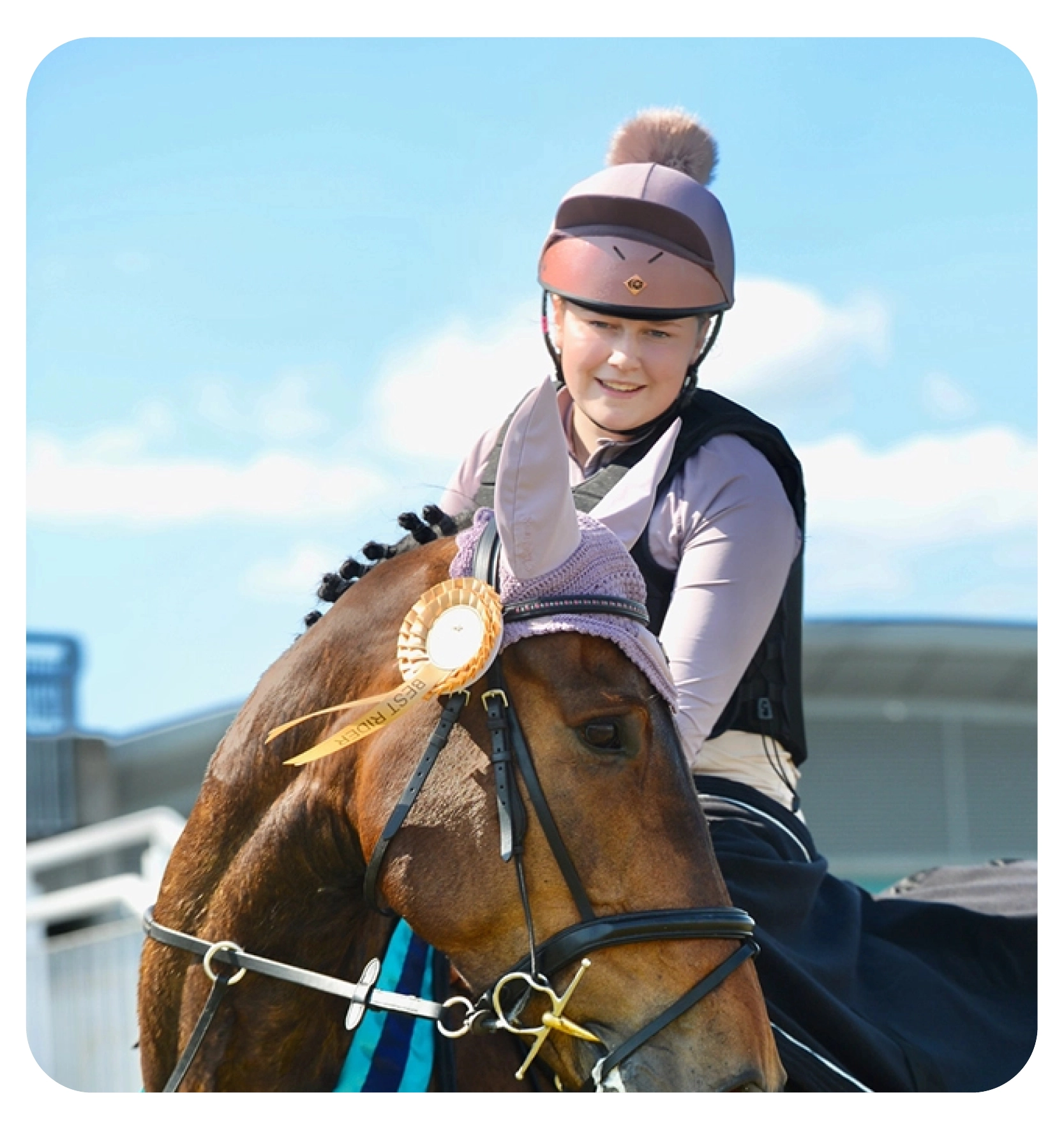 woman on a horse doing the heart sign 