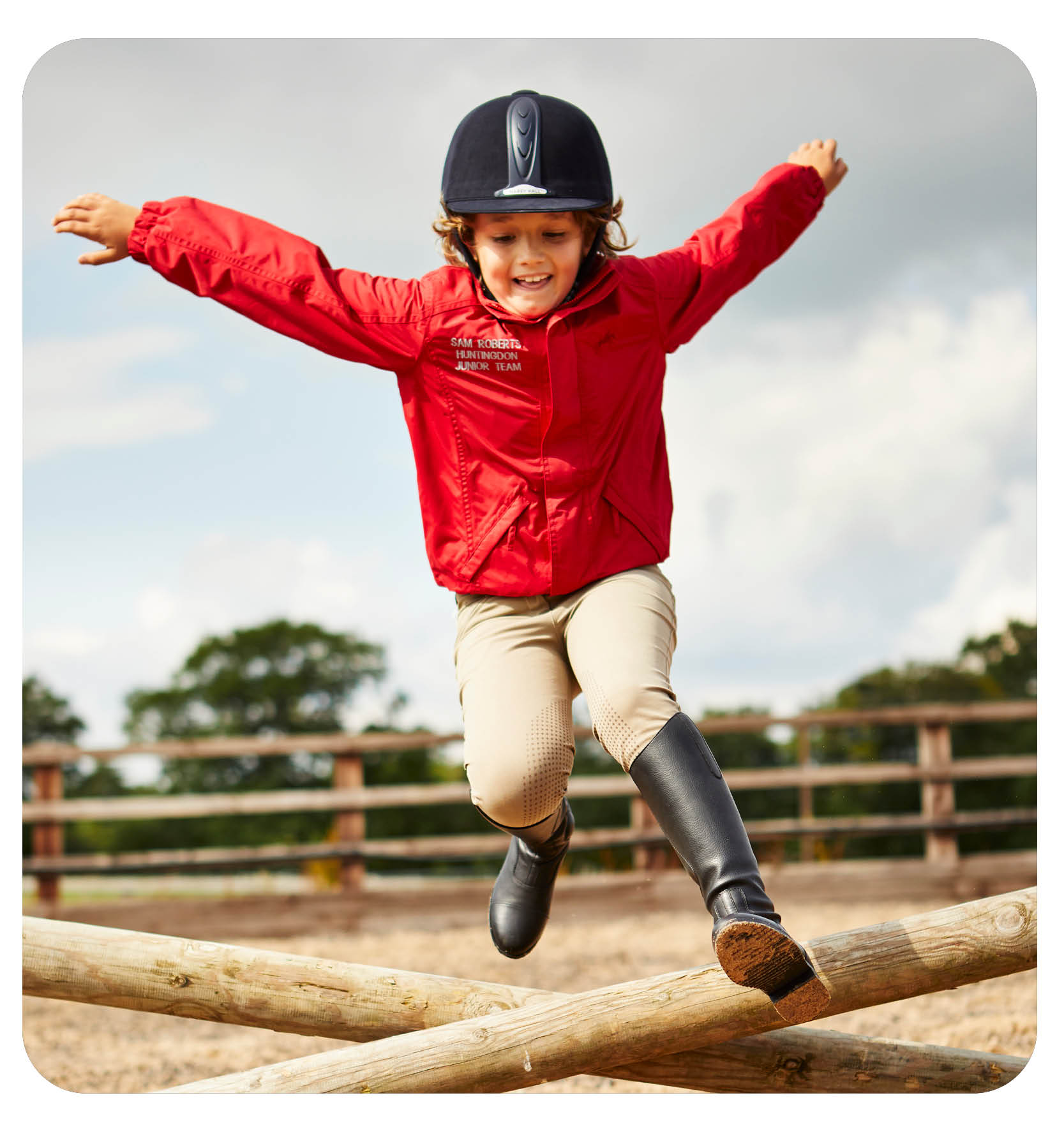 woman on a horse doing the heart sign 