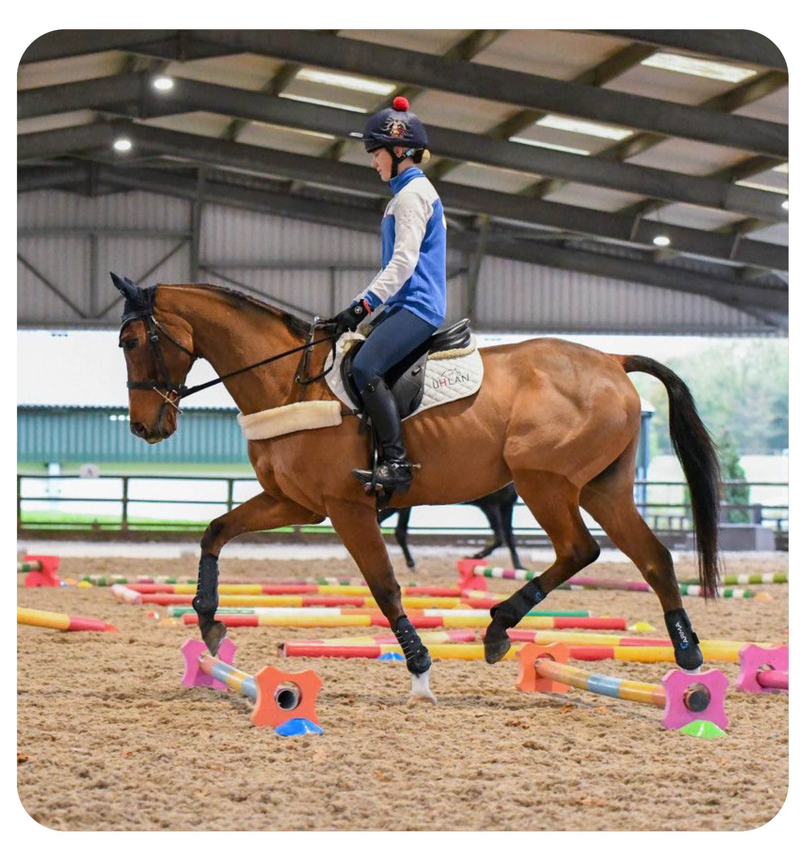 woman on a horse doing the heart sign 